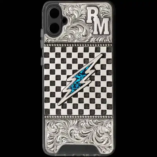 "The ideal accessory to complete your western look. Our Rebel Custom Phone Case features a hand-engraved German Silver plate securely attached to the phone case. The base showcases expert craftsmanship with a checkered board design, bead edges, lette